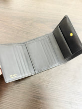Load image into Gallery viewer, PRADA Vitello Move Trifold Wallet in Black