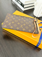 Load image into Gallery viewer, LOUIS VUITTON Monogram Neverfull MM Pochette Wristlet Pouch In Fuchsia
