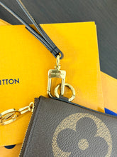 Load image into Gallery viewer, LOUIS VUITTON 2023 Monogram Giant Rectangular Wristlet Pouch