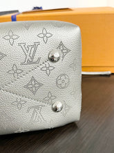 Load image into Gallery viewer, LOUIS VUITTON 2023 Bella Mahina Leather Bucket Bag in Gray Metallic