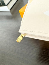 Load image into Gallery viewer, LOUIS VUITTON 2021 Monogram Empriente Leather Toiletry Pouch 26 in Cream Saffron