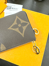 Load image into Gallery viewer, LOUIS VUITTON 2023 Monogram Giant Rectangular Pouch