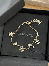 Load image into Gallery viewer, CHANEL CC Chain Anklet Bracelet Metal with Faux Pearl in Gold & Pearly White