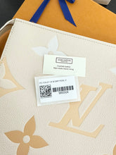 Load image into Gallery viewer, LOUIS VUITTON 2021 Monogram Empriente Leather Toiletry Pouch 26 in Cream Saffron
