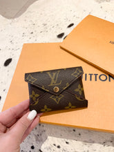 Load image into Gallery viewer, LOUIS VUITTON 2021 Monogram Pochette Kirigami Small Pouch