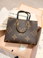 Load image into Gallery viewer, LOUIS VUITTON 2021 OnTheGo MM Monogram Reverse Tote Bag