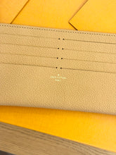 Load image into Gallery viewer, LOUIS VUITTON 2024 Empreinte Leather Card Holder in Arizona
