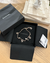 Load image into Gallery viewer, CHANEL CC Chain Anklet Bracelet Metal with Faux Pearl in Gold &amp; Pearly White
