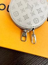 Load image into Gallery viewer, LOUIS VUITTON 2023 Bella Mahina Leather Round Coin Purse in Gray Metallic
