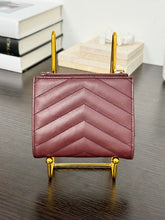 Load image into Gallery viewer, SAINT LAURENT Cassandre Matelasse Embossed Leather Bi-Fold Wallet in Burgundy
