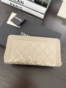 CHANEL Boy Medium Metallic Zipped Wallet in Gold