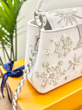 Load image into Gallery viewer, LOUIS VUITTON 2024 - LIMITED EDITION - Capucines Mini Ski Snowflake Satchel Bag
