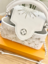 Load image into Gallery viewer, LOUIS VUITTON 2024 - LIMITED EDITION - Capucines Mini Ski Snowflake Satchel Bag
