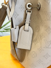 Load image into Gallery viewer, LOUIS VUITTON 2024 Muria Mahina Leather Bucket Bag in Galet Gray
