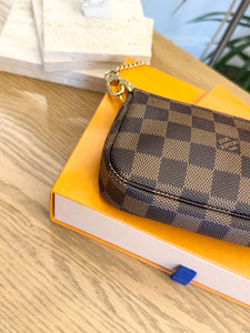 LOUIS VUITTON Damier Ebene Canvas Mini Pochette Accessoires