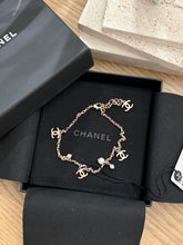 Load image into Gallery viewer, CHANEL CC Chain Anklet Bracelet Metal with Faux Pearl in Gold &amp; Pearly White
