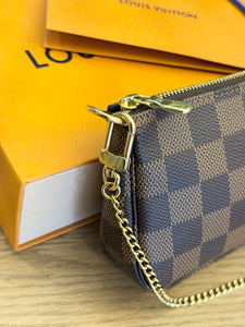 LOUIS VUITTON Damier Ebene Canvas Mini Pochette Accessoires