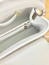 Load image into Gallery viewer, LOUIS VUITTON 2024 - LIMITED EDITION - Capucines Mini Ski Snowflake Satchel Bag
