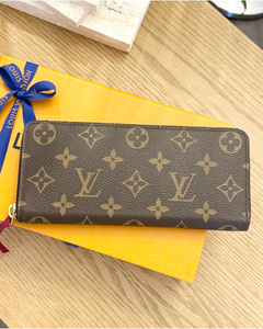 LOUIS VUITTON Clémence Monogram Zippy Wallet in Fuchsia