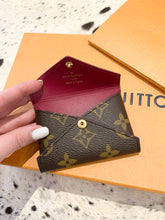 Load image into Gallery viewer, LOUIS VUITTON 2021 Monogram Pochette Kirigami Small Pouch
