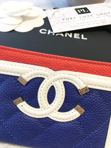 [SOLD] CHANEL 2019 Caviar Quilted Leather Filigree Card Holder In White/Blue/Red