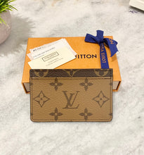 Load image into Gallery viewer, LOUIS VUITTON 2021 Monogram Reverse Canvas Card Holder
